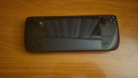 Steam Deck Oled 1tb with case, charger, and dock