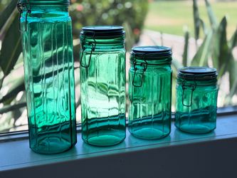 Vintage green glass Hermetic 12-sided canister set with wire bail seal