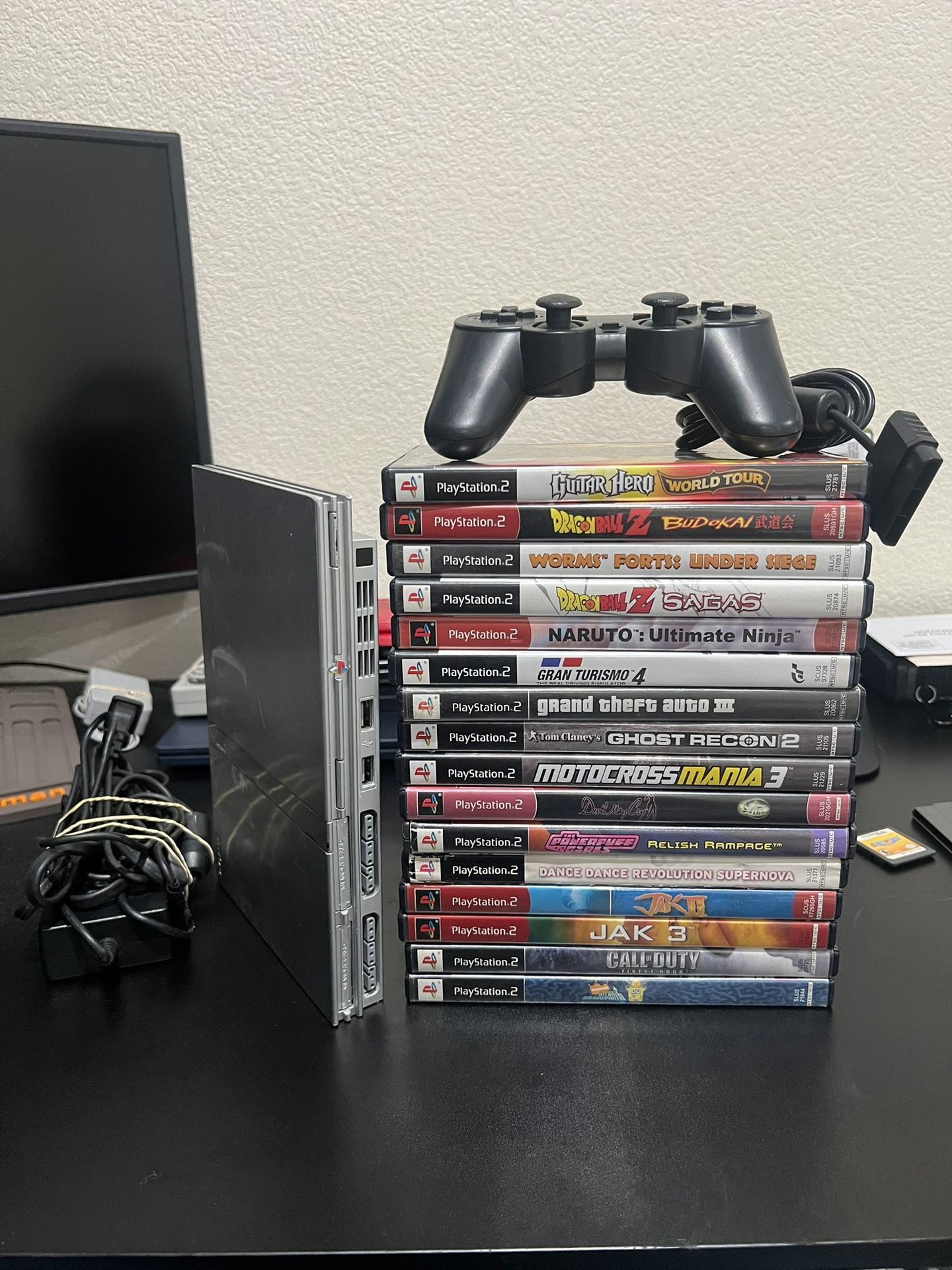 PS2 Slim With Game And Memory Card. 