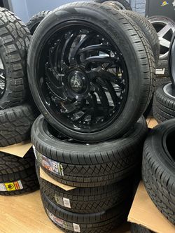 24 inch rims and tires. Gloss black. 285/40r24