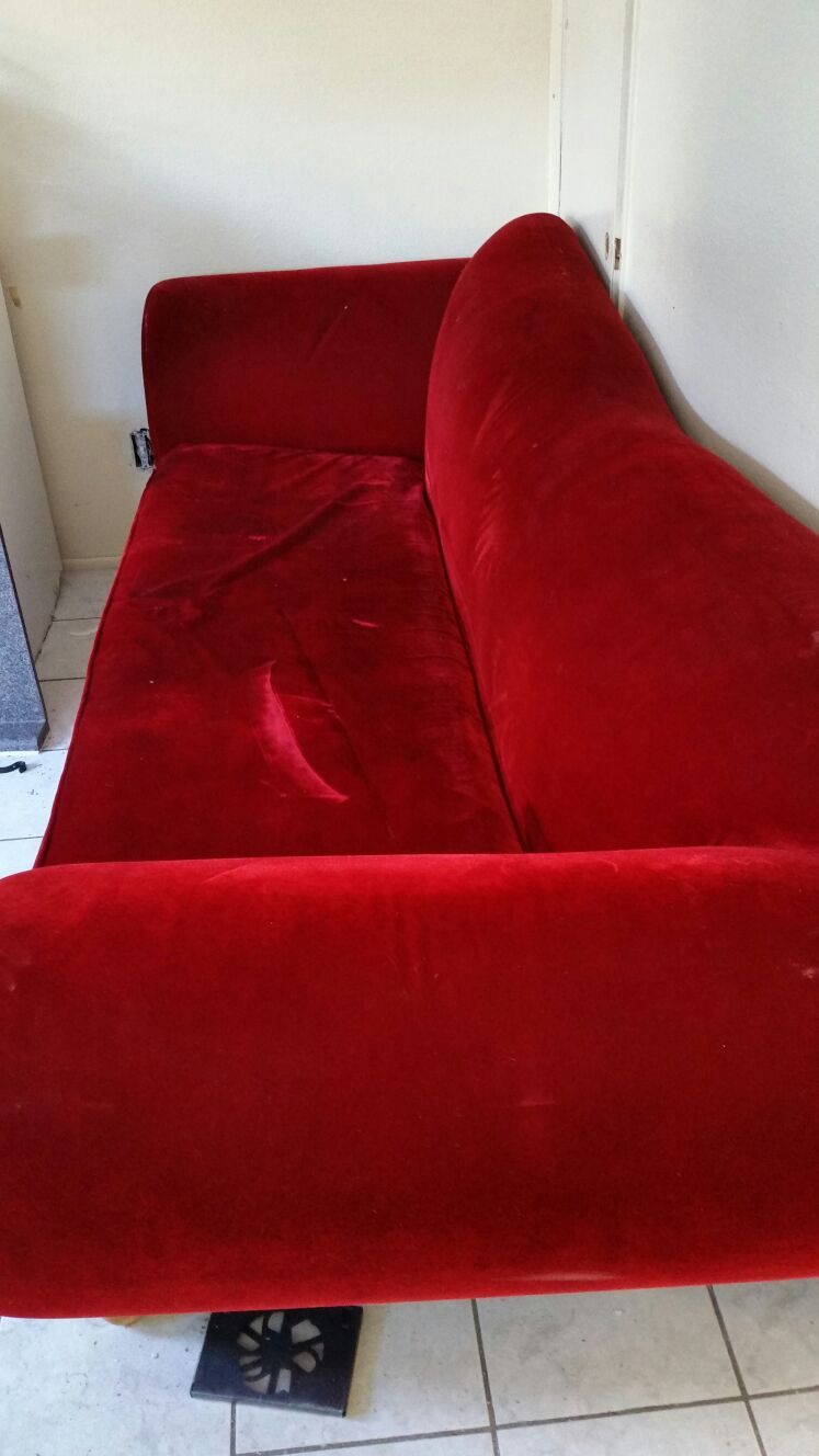 Red velvet couch