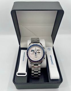 Omega / Swatch , Snoopy moon phase watch