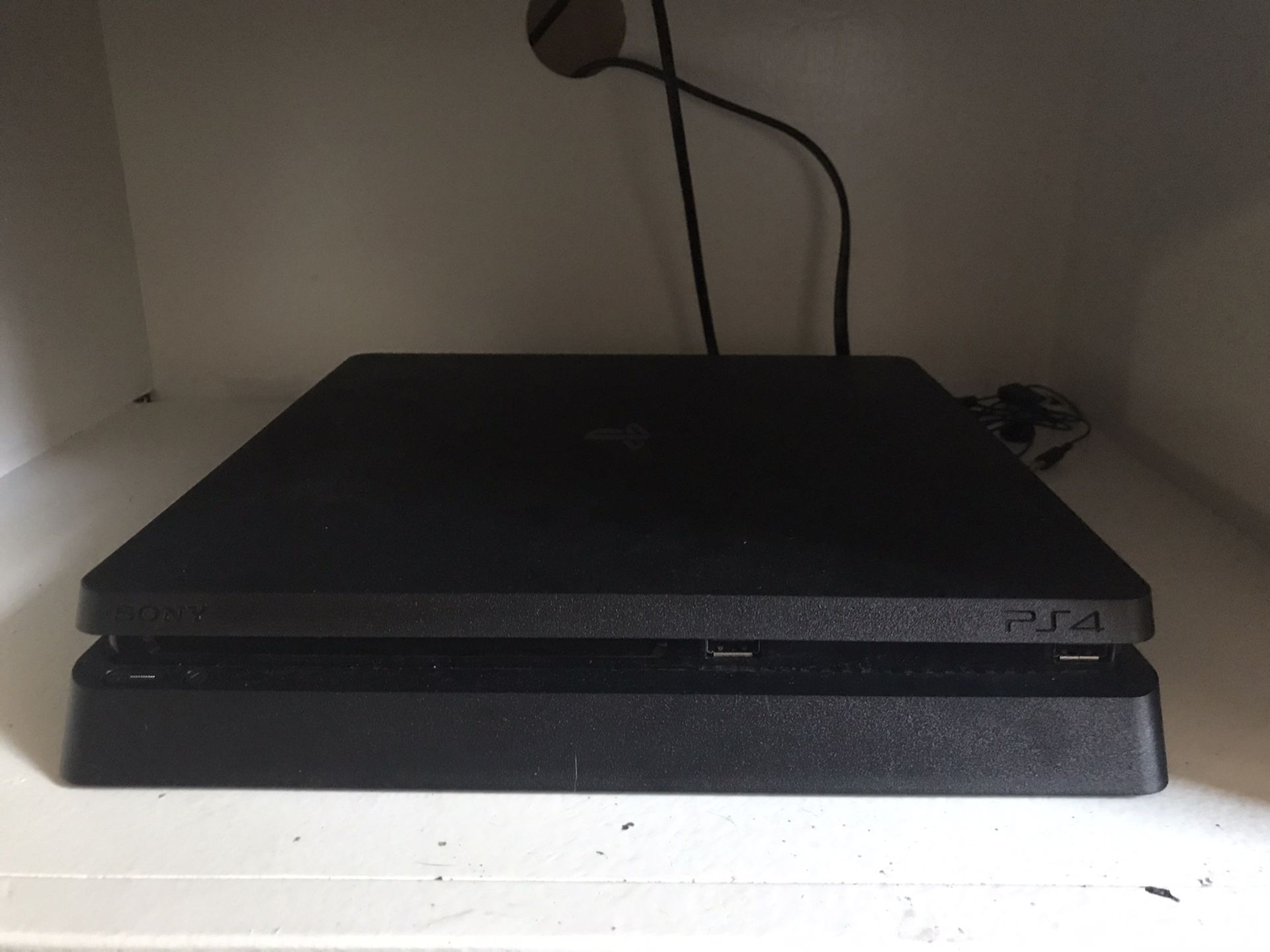 PS4 Slim 1TB w 2 Controllers and 5 games