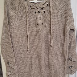 Urban Heritage 
Beige Knit sweater with tied rivets,Lace up
Mint Condition 
Size Small
