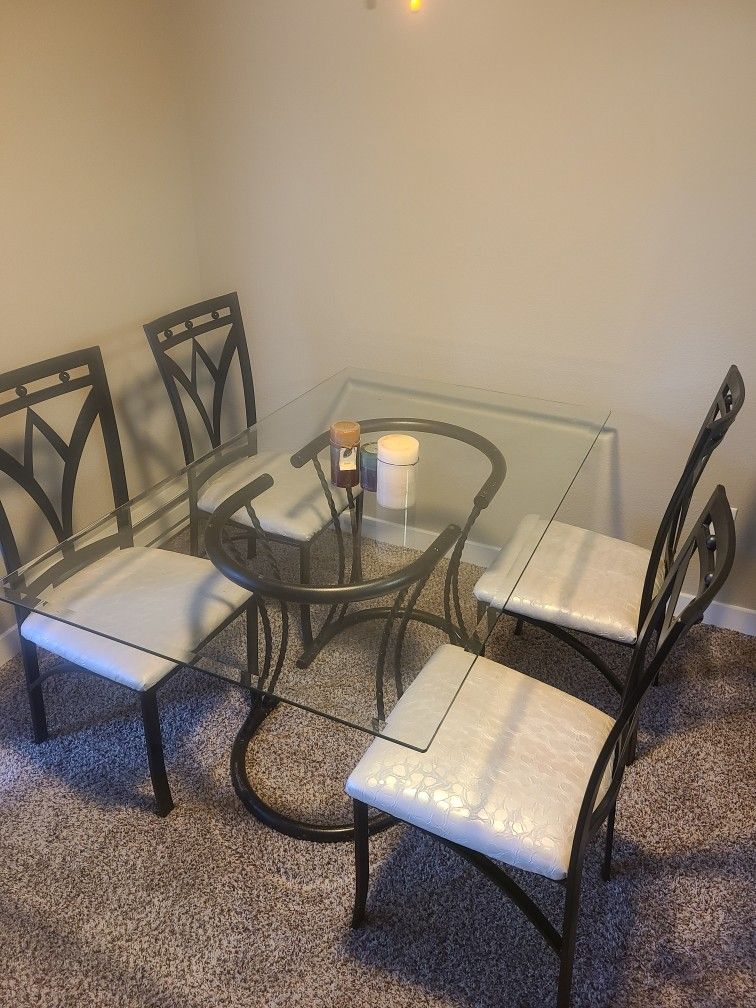 Dining room glass table and 4 chairs