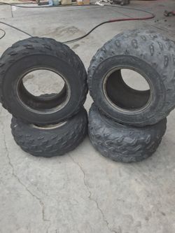 Quad tires 20x10-9 rear 22x7-10 front $60 set of 4