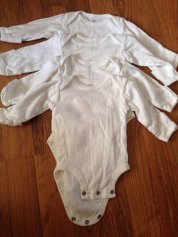 4 Carter's long sleeve onesies size nb