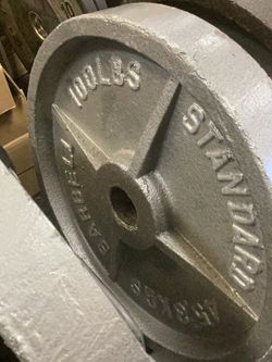 Pair of 100 pound Olympic plates