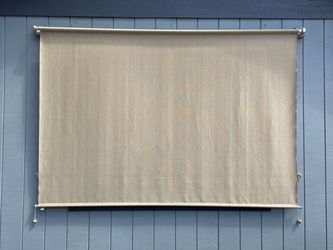 Exterior roll up window shade