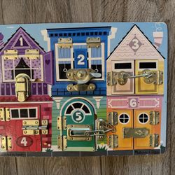 Melissa and Doug Latches Board