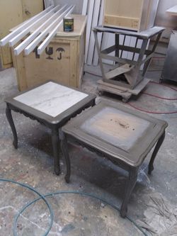 Solid mahogany wood end tables with marble centers. Just refinished and ready for a new home!