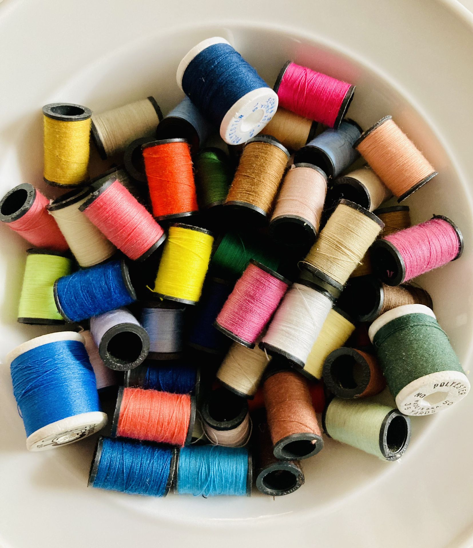 40+ spools 🧵 of thread, vibrant & traditional colors