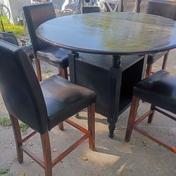 Counter height table and chairs set