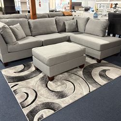 Grey reversible sectional W/ ottoman