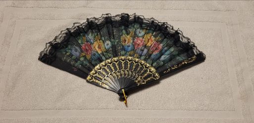 Hand held fans