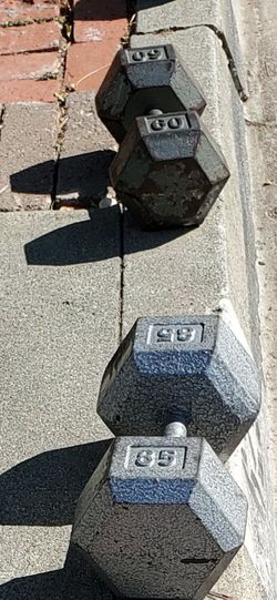 2 - 60lb Dumbells also 2-  85lb