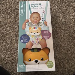Infantino: 2-in-1 Music and Lights Doorway Jumper