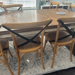 Table and cross back chairs