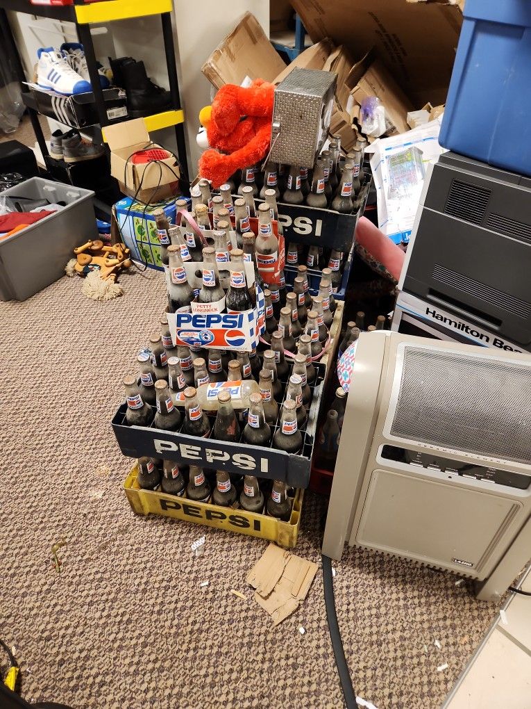 Collection of vintage richard petty pepsi bottles