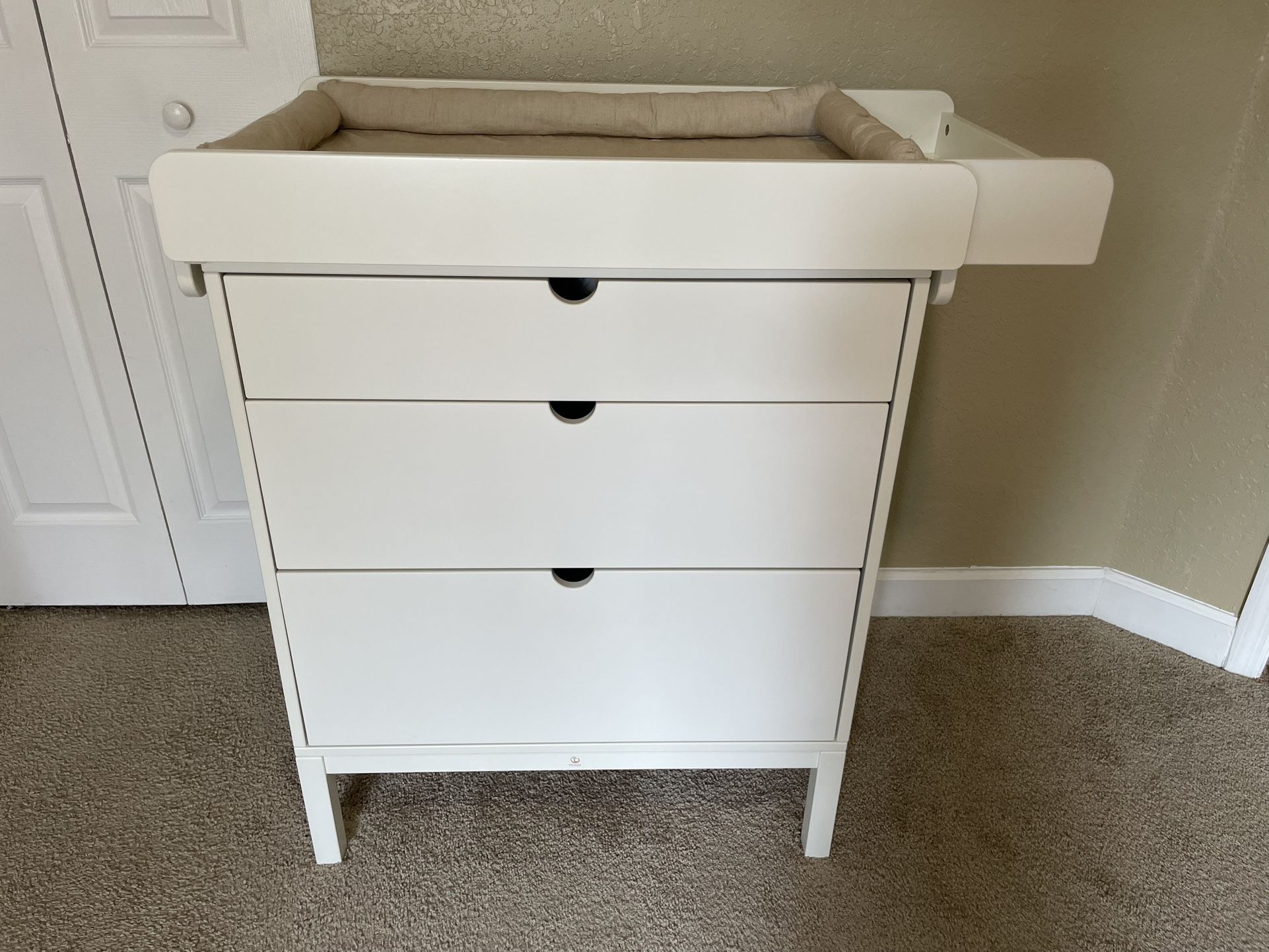 Stokke Chest of drawers and changing table with pillow.