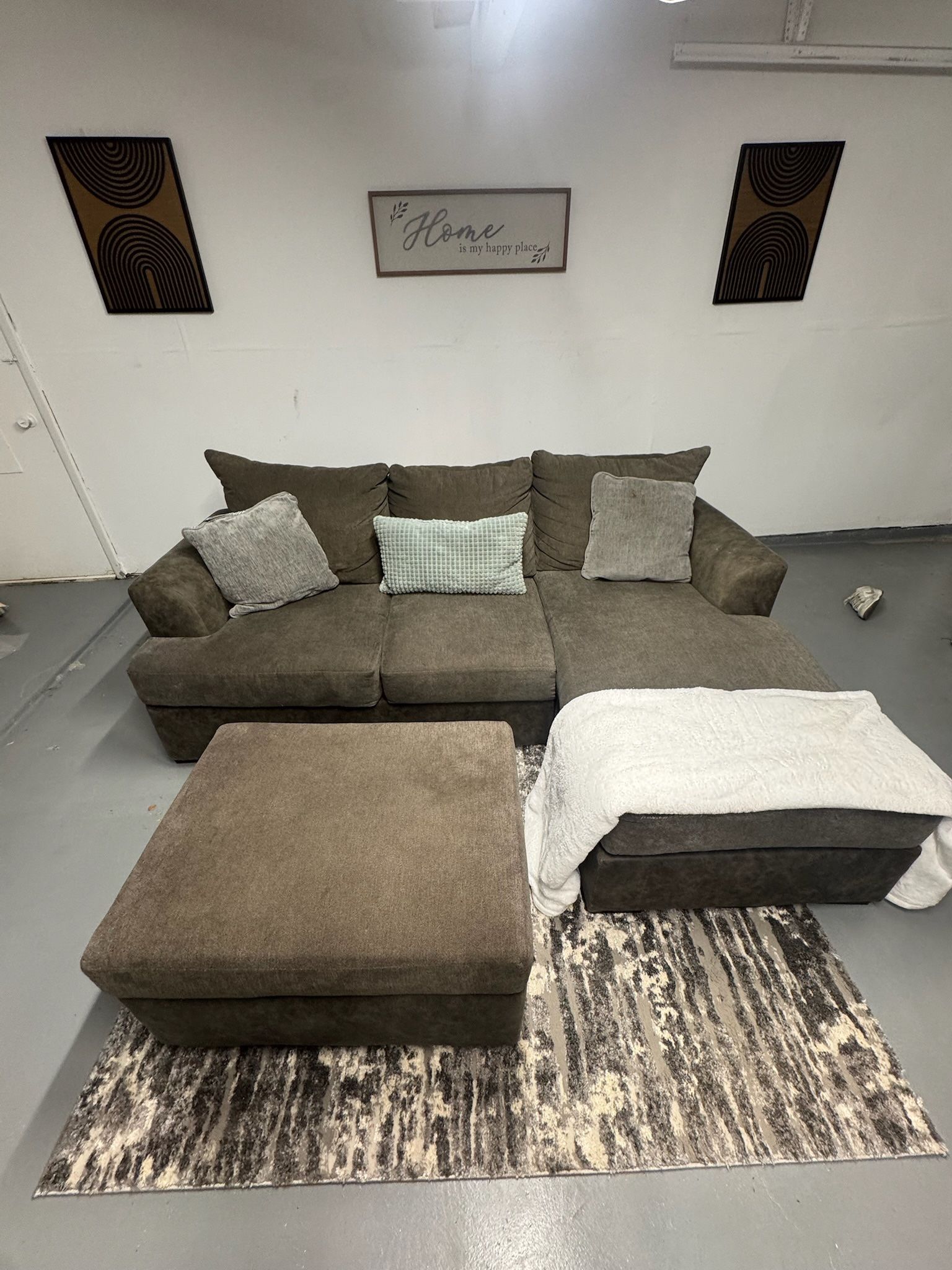 Grey small sectional w/ottoman delivery available