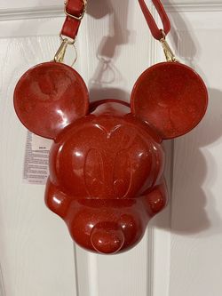 Disney Parks Mickey Mouse molded loungefly crossbody sparkle red purse. Brand new with tags. No scratches perfect condition . The lighting is not v