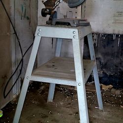 Craftsman Miter Saw Mounted on a Metal Stand
