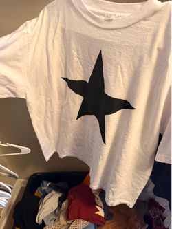 Ye at Raymond James white tee