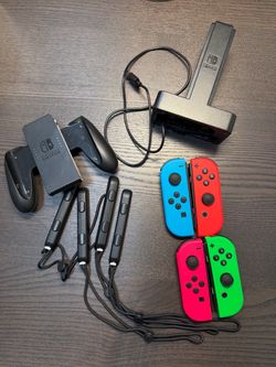 Nintendo Switch 4 Joy-Cons (2 Pairs) + 4-in-1 Charging Dock Bundle