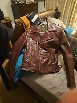 Vintage original Golden Bear lined, leather rider jacket . Color is Tobacco best i can guess. Size 38