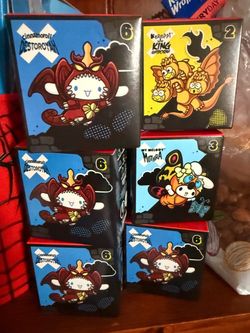 Hello kitty/ Godzilla