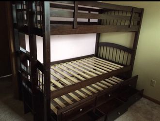 Triple bunkbed with storage drawers