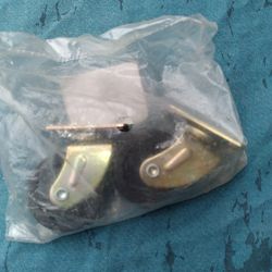 Set of Waxman 1⅝ Black Roller Caster Plate wheels