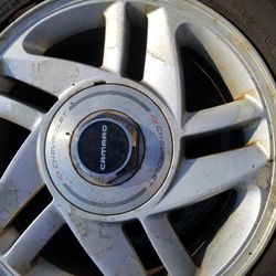 CAMARO FACTORY WHEELS SET OF FOUR, WITH TIRES 245/50ZR 16 INCH, 97W, 2 TIRES FAIR, OTHER 2 GOOD FOR SPARE. $80. CASH TODAY!