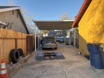 Custom Carports/ Gates And More