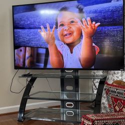 Vizio 65’ TV With Stand