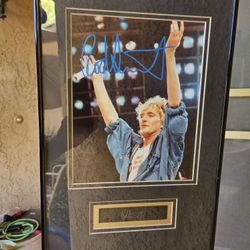 Signed and mounted Rod Stewart photo