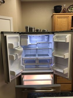 GE PROFILE stainless steel refrigerator and stove works good