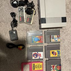 Nintendo NES + 5 Games (hablo Espanol)