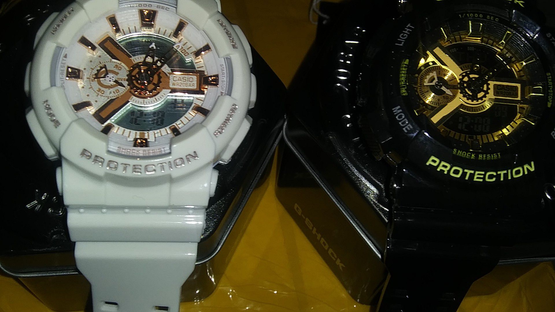 Two g shock watches with cases sale for $100