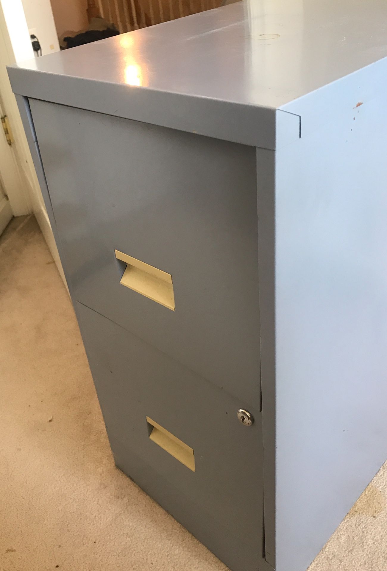 Filing cabinet. Doors don’t close properly