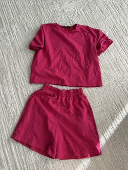 a set — shorts and T-shirt.