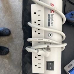 APC SurgeArrest Network surge protector with 7 outlets.