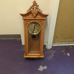 small antique grandfather clock