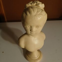 vintage Alexander Backer chalkware bust of a young girl with a bow in her hair. 