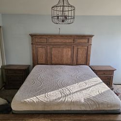 Wooden cow, king bed frame and two end tables