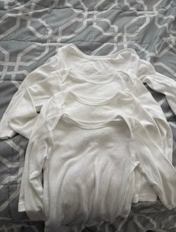 Carter’s free white long sleeve onesies