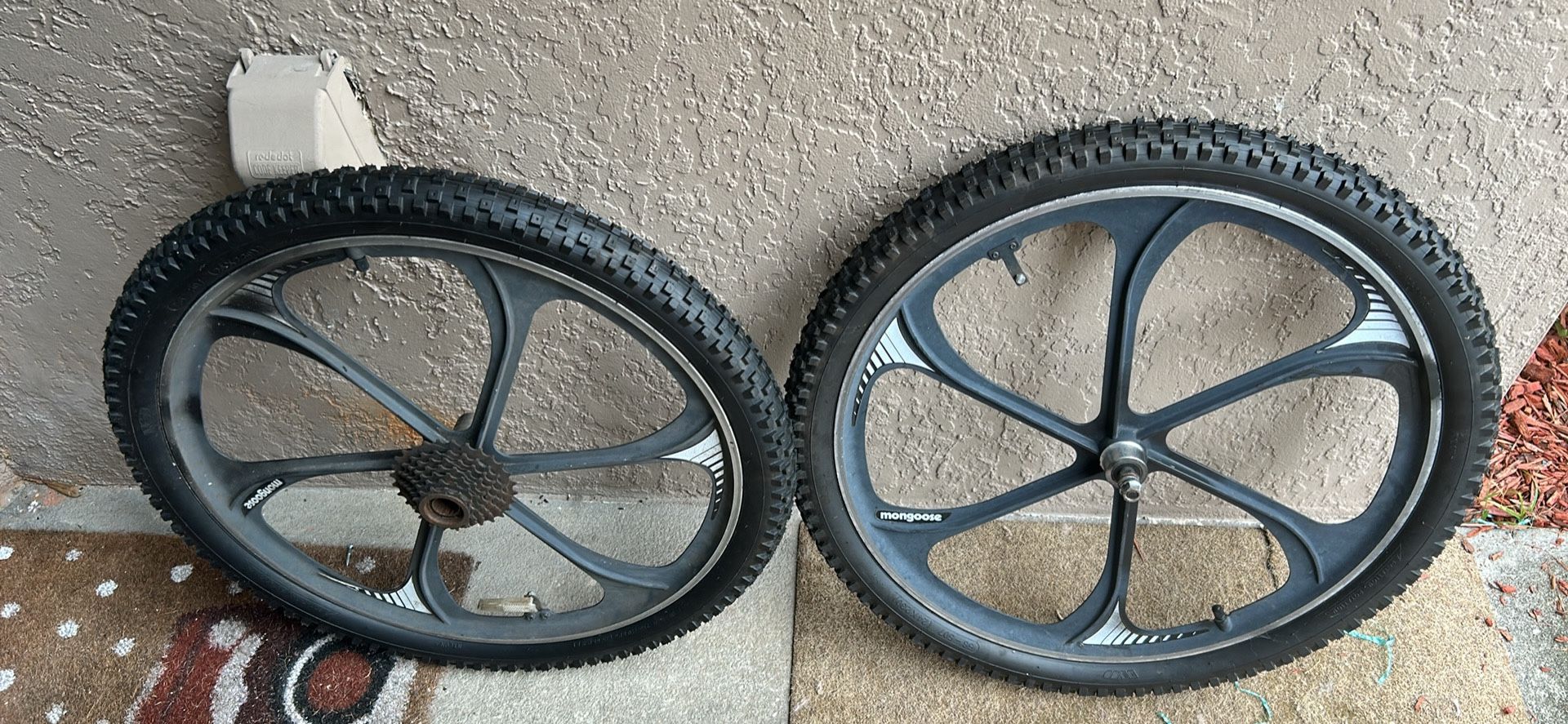 A pair of 24 inch mongoose, rim tire inner tubes
