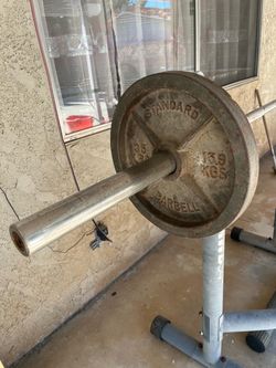 Weight Bench paired With Barbell