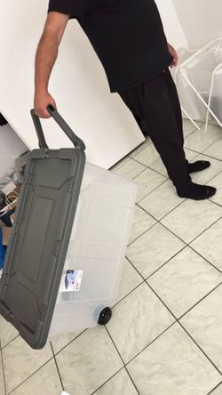 Large plastic box on wheels